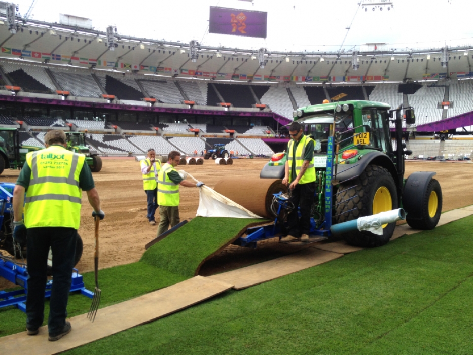 Talbots get to work laying turf at the London 2012 Olympics